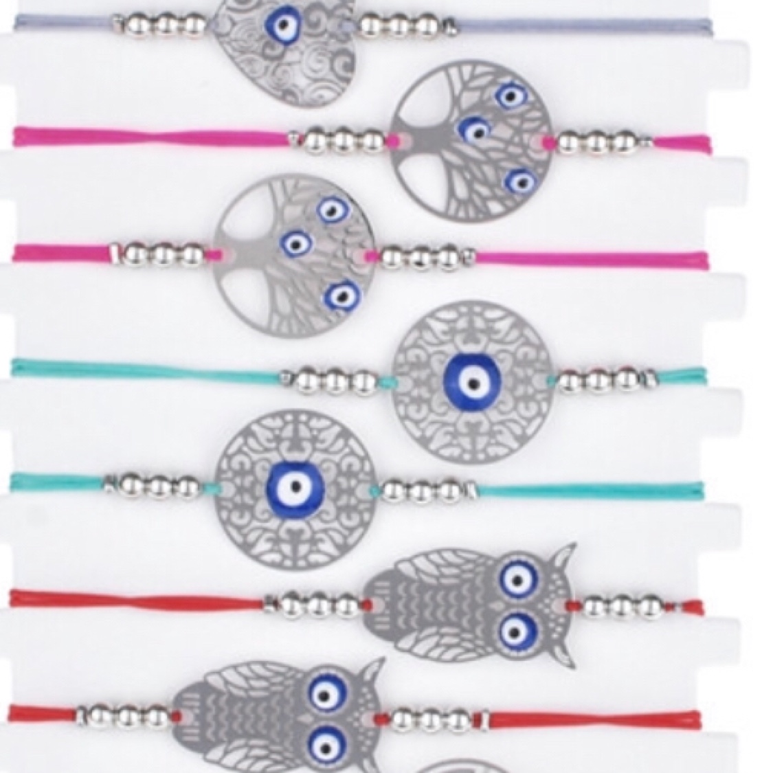 不锈钢配饰蓝眼睛手工编织蜡绳手链