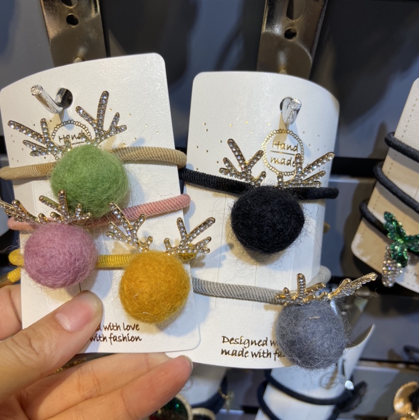 Cuerno de ciervo peludo bola cabeza cuerda