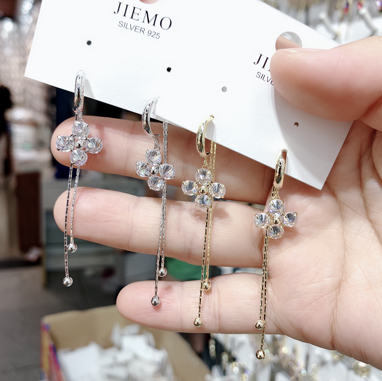 Two four-leaf clover tassel earrings
