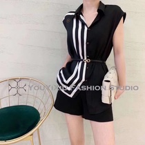 Silk blouse black shorts