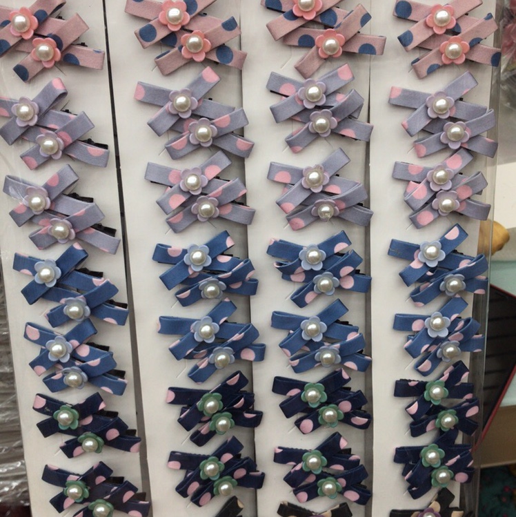 Korean version of the cloth little crossing pearl floret clamp