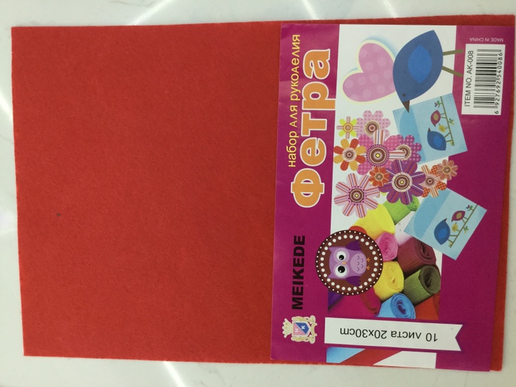 Bright red nonwoven fabric
