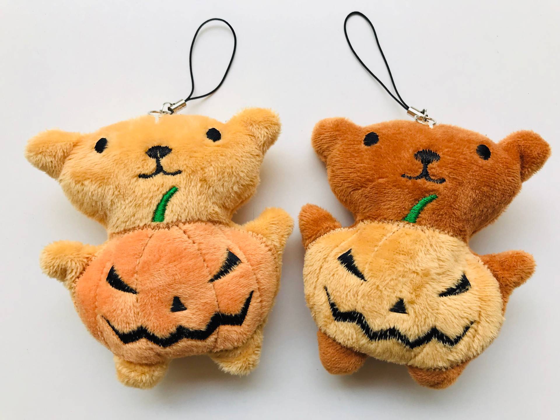 Gold pumpkin doll key chain Cartoon plush toy doll Halloween gift bag pendant key chain woman