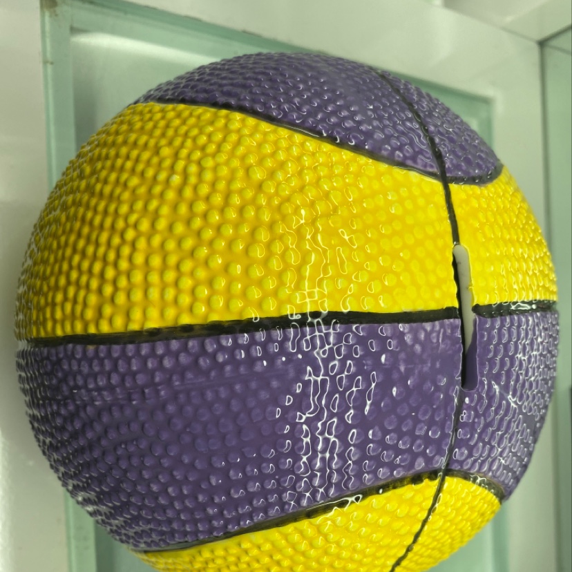 An 8-inch basketball piggy bank