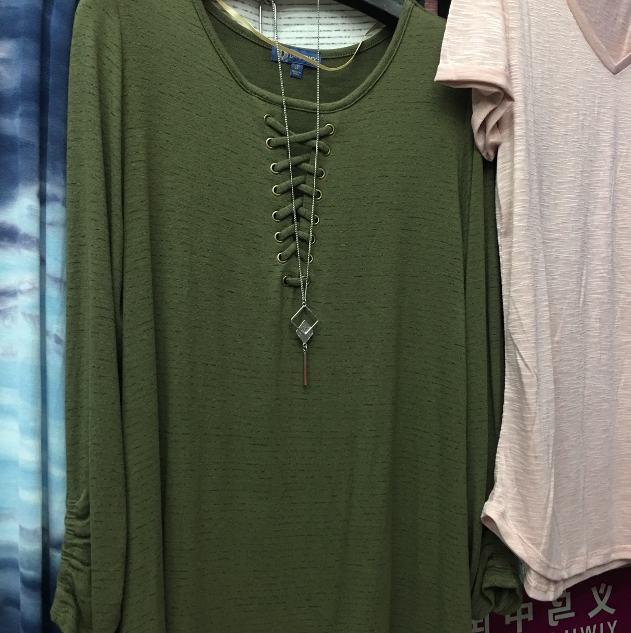 Lady's dark green jacket in stock thumbnail