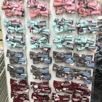 Korean version of fashion fabric bowknot clip on small floral logo clip on edge clip