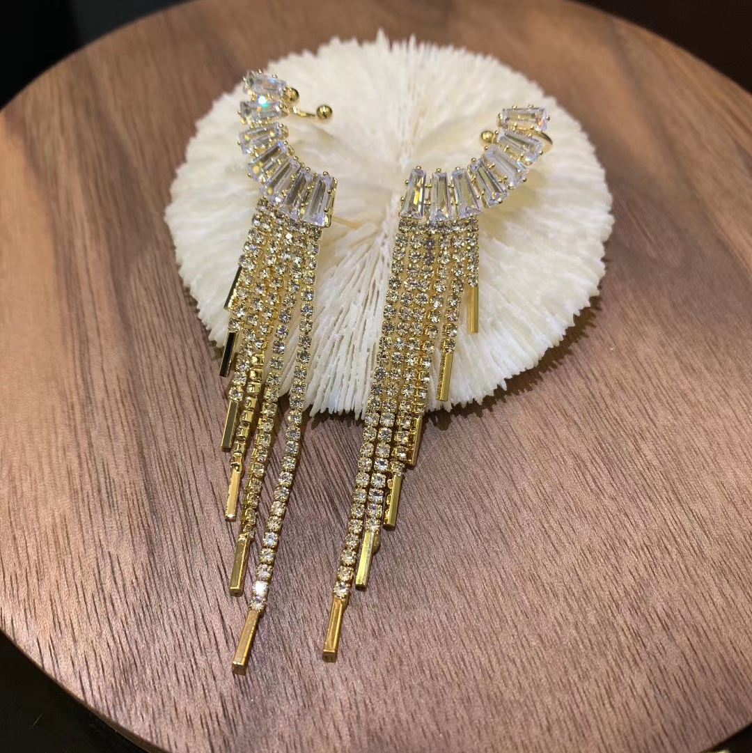 Oumei Feng exaggerated earrings and earrings