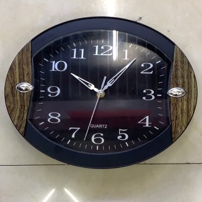 Oval wood wall clock thumbnail