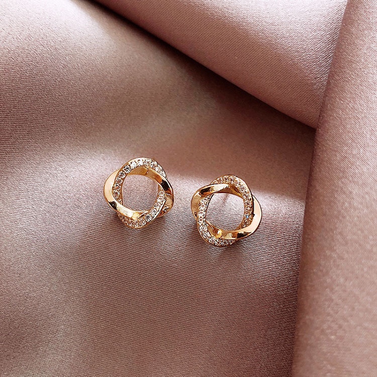 Copper plated with 18k real gold and slightly inlaid zircon, 2020 new trendy and stylish cross-circle stud commuting earrings for female Internet celebrities