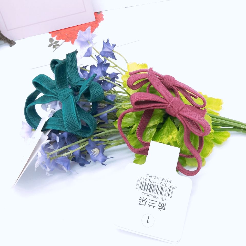 South Korea's new simple high elastic solid color knot flat bow hair loop hair rope hair accessories Application Scenario