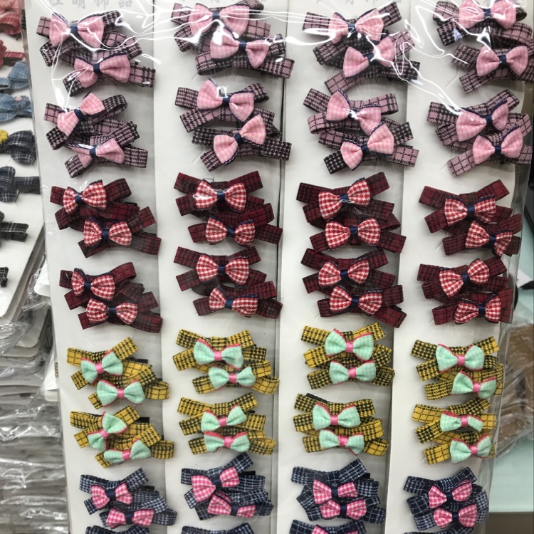 Korean version of fashion fabric bow cross bow lattice clip