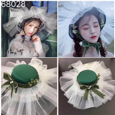 A dark green top hat