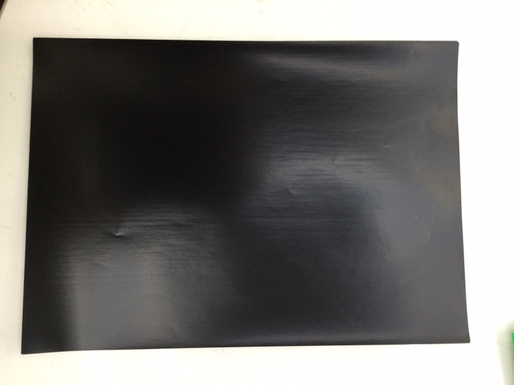 Black waxed paper