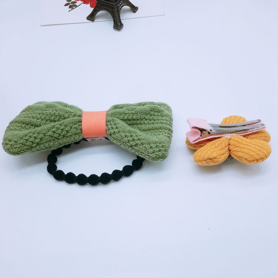 Korean version of Instagram cute little flower hairpin children's plaid fabric bow hairpin girl bangs clip clip headdress Application Scenario