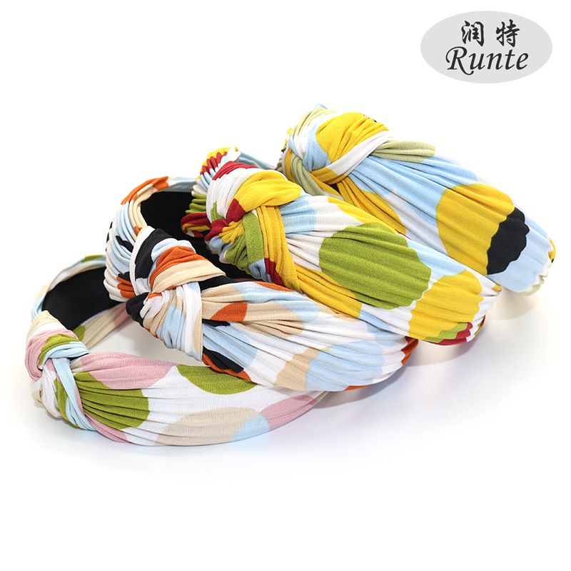 Factory direct sales of Korean-style fabric headbands and hair accessories. Fashionable and simple. Cross knot wide edge polka dot headbands for women