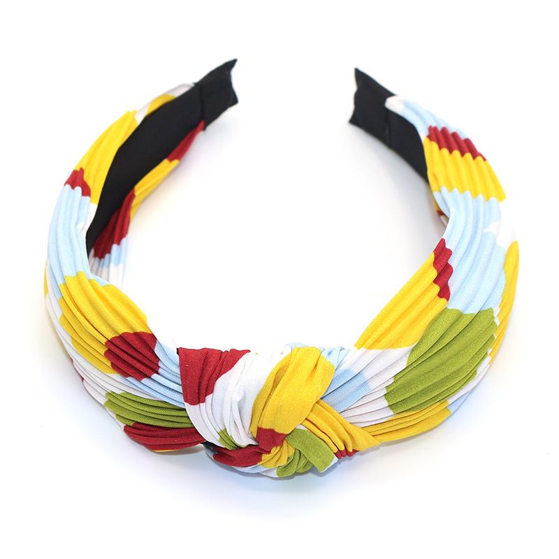 Factory direct sales of Korean-style fabric headbands and hair accessories. Fashionable and simple. Cross knot wide edge polka dot headbands for women detail image 4