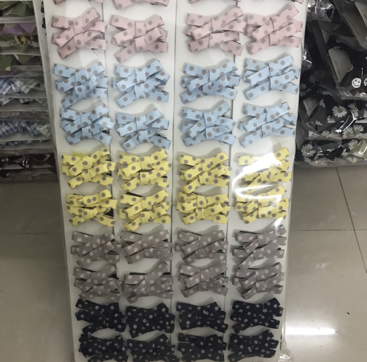 Korean version of the fashion fabric bow crossing point on the clip