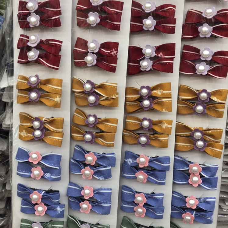 Korean version of the fashion fabric bowknot floret pearl clip