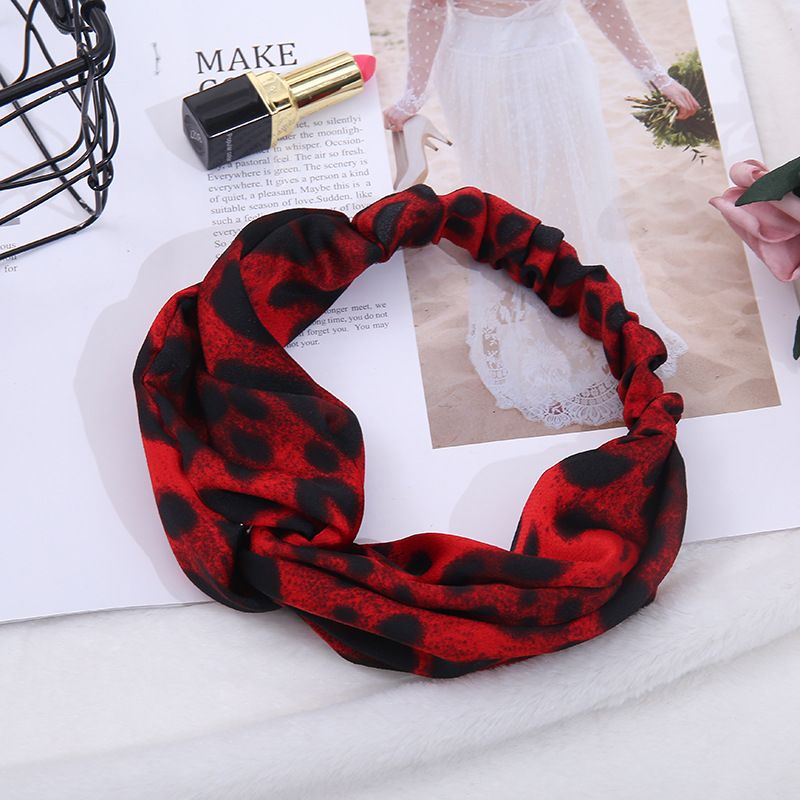 Factory direct sales of 2019 new trendy leopard print cross headband with retro European and American elastic hair accessories details Picture