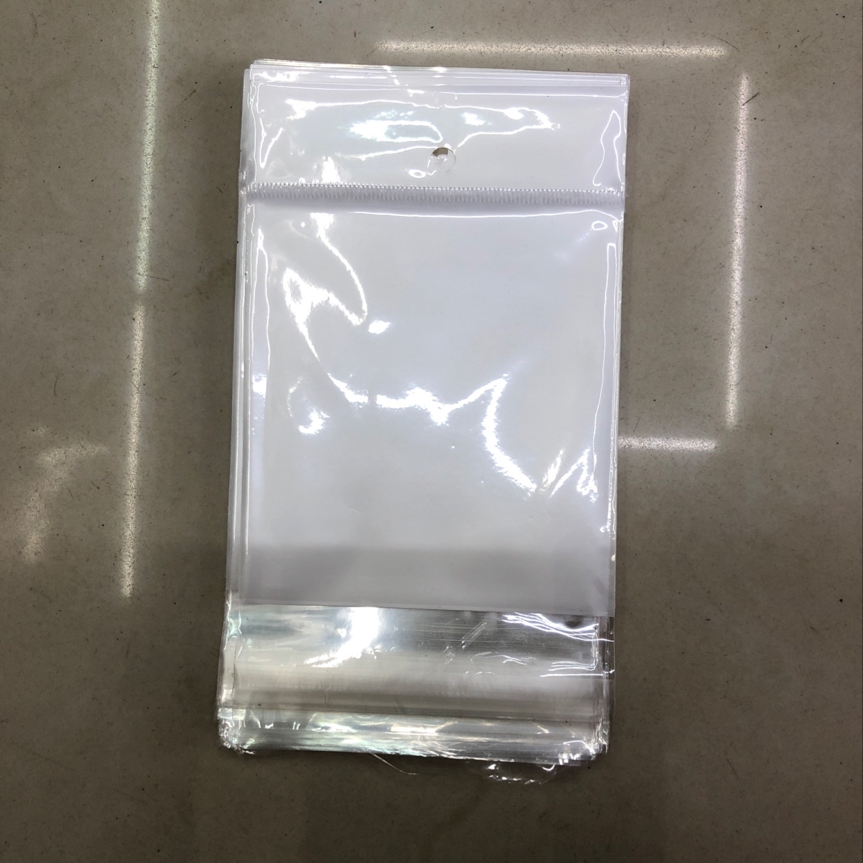 Pearlescent film card bag self-adhesive bag transparent self-sealing bag clothing dust seal plastic bag mask bag wholesale, manufacturers direct sales, welcome to sample order. thumbnail