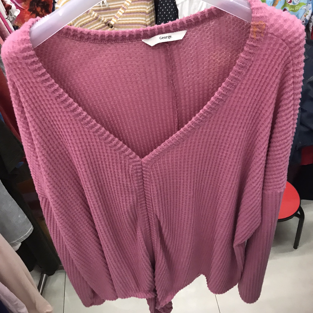 Pink V-neck sweater thumbnail