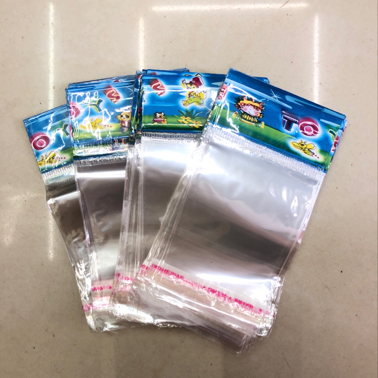 Color card head bag self-adhesive bag transparent self-sealing bag clothing dust seal plastic bag mask bag wholesale, manufacturers direct sales, welcome to sample order thumbnail