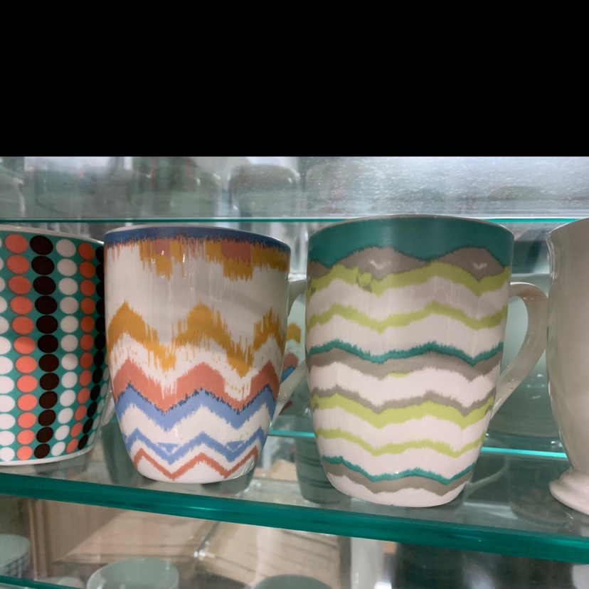 The ceramic cup features a simple style details Picture