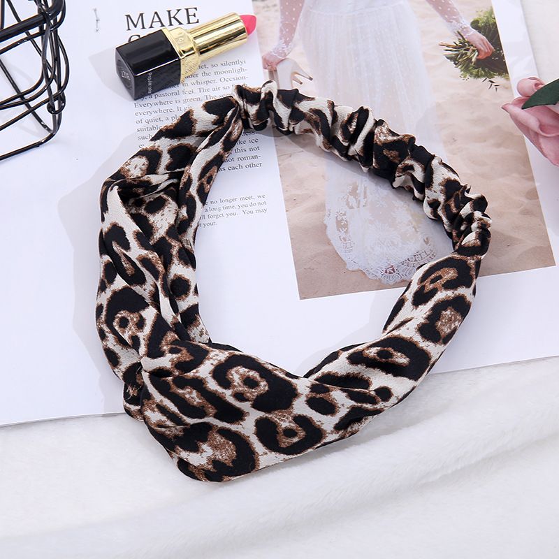 Factory direct sales of 2019 new trendy leopard print cross headband with retro European and American elastic hair accessories Specification image