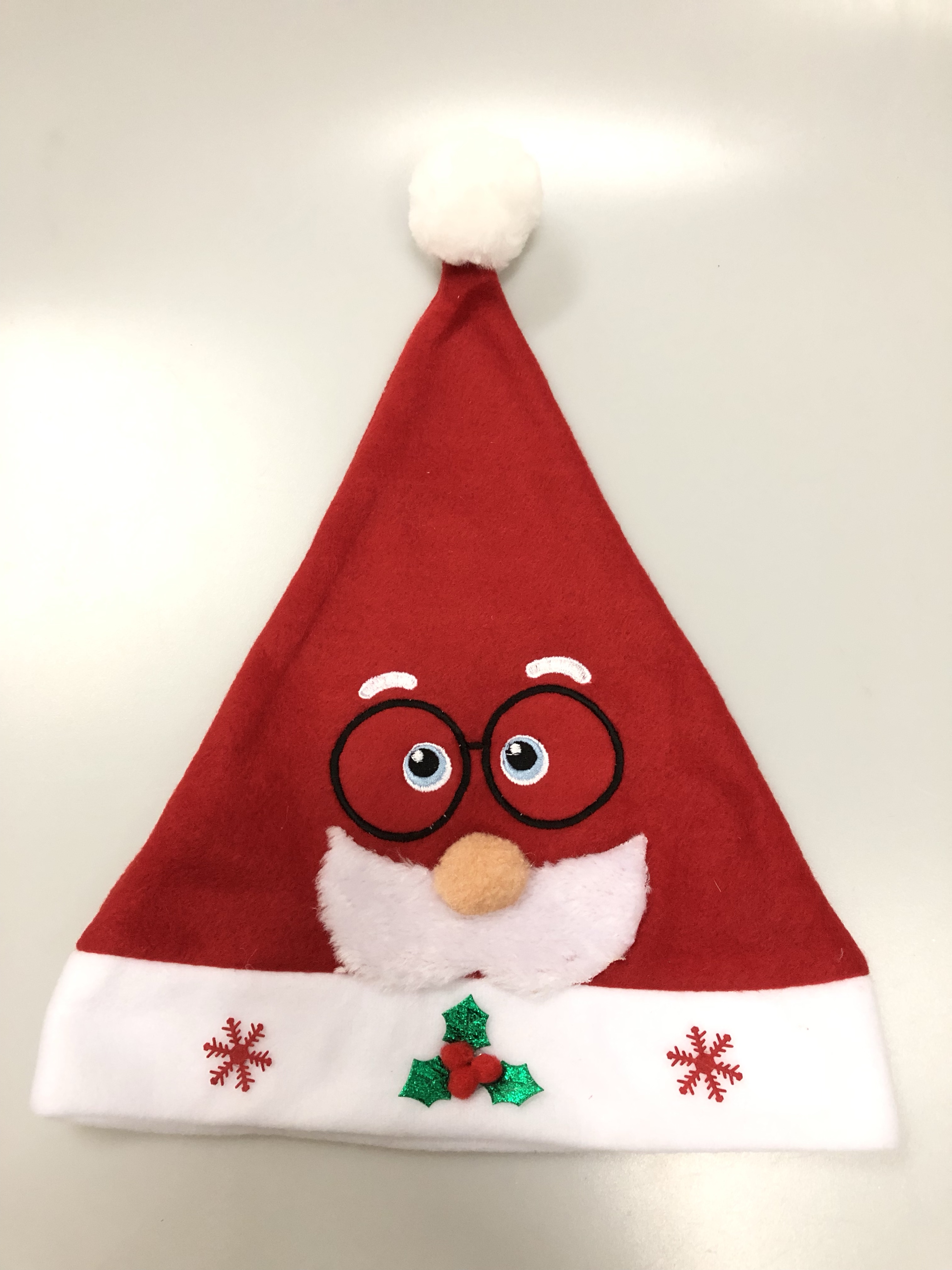 A velvet embroidered Santa Claus hat details Picture