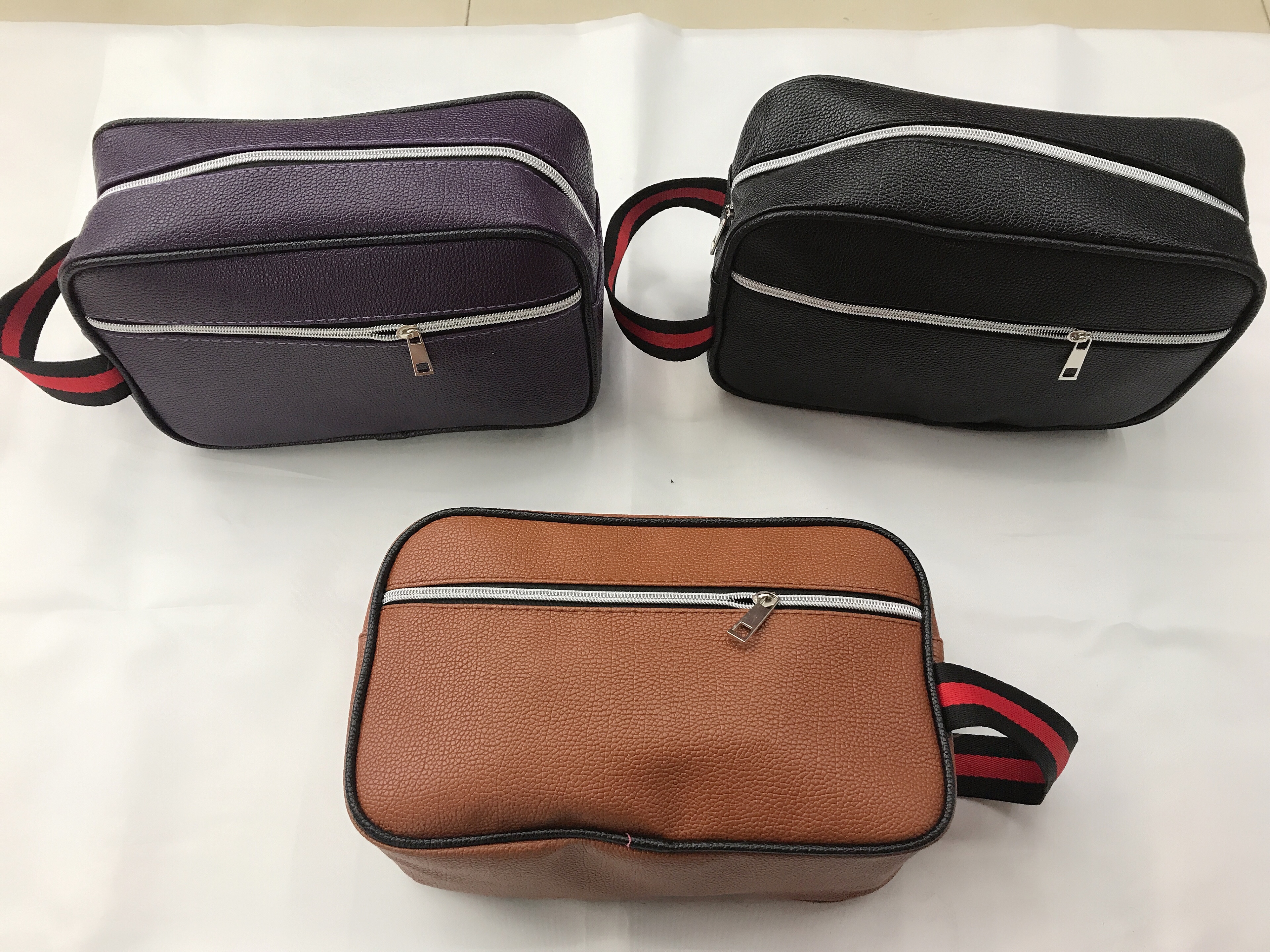 荔枝纹化妆包洗漱包收纳包手腕包PU化妆包产品图