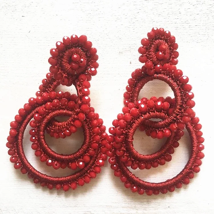 There are three earrings on 351