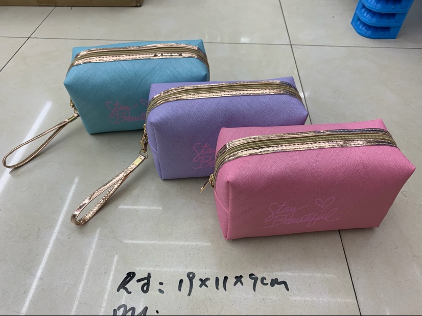 PU化妆包八角化妆包收纳包幻彩化妆包图