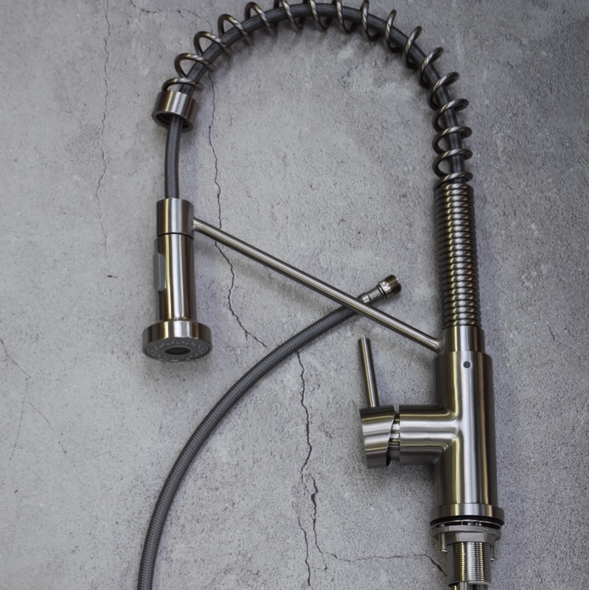 Acero inoxidable spring puller grifo con cabezal