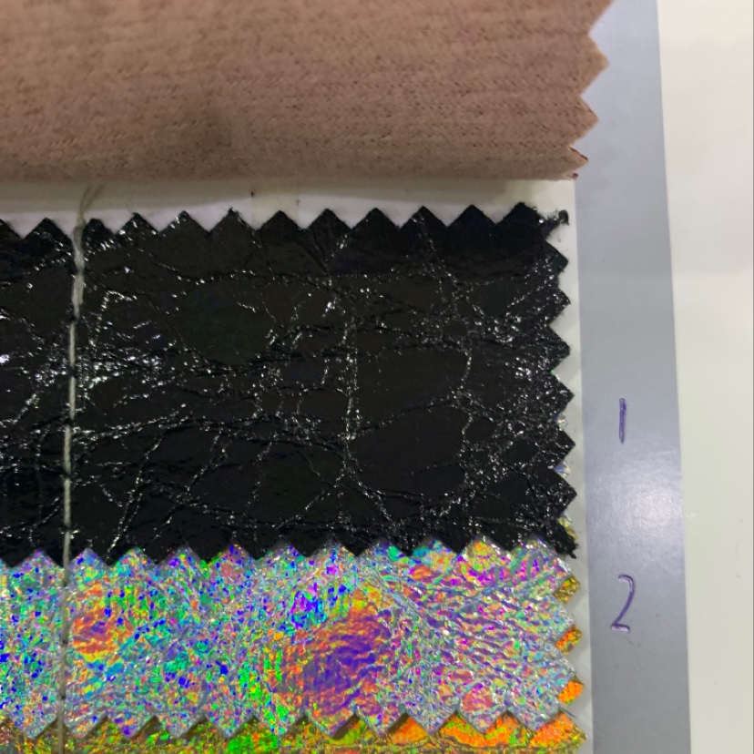 厂家直销热销新款皮革大量现货高中低档箱包沙发鞋材面料镭射大爆裂1-2产品图