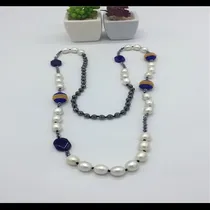 The crystal necklace lay 357