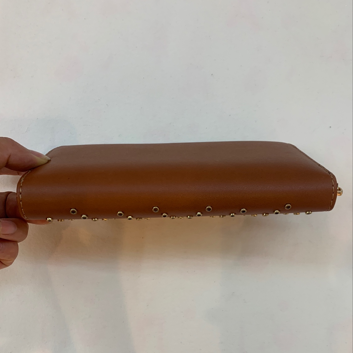 单面打钉拉链包产品图