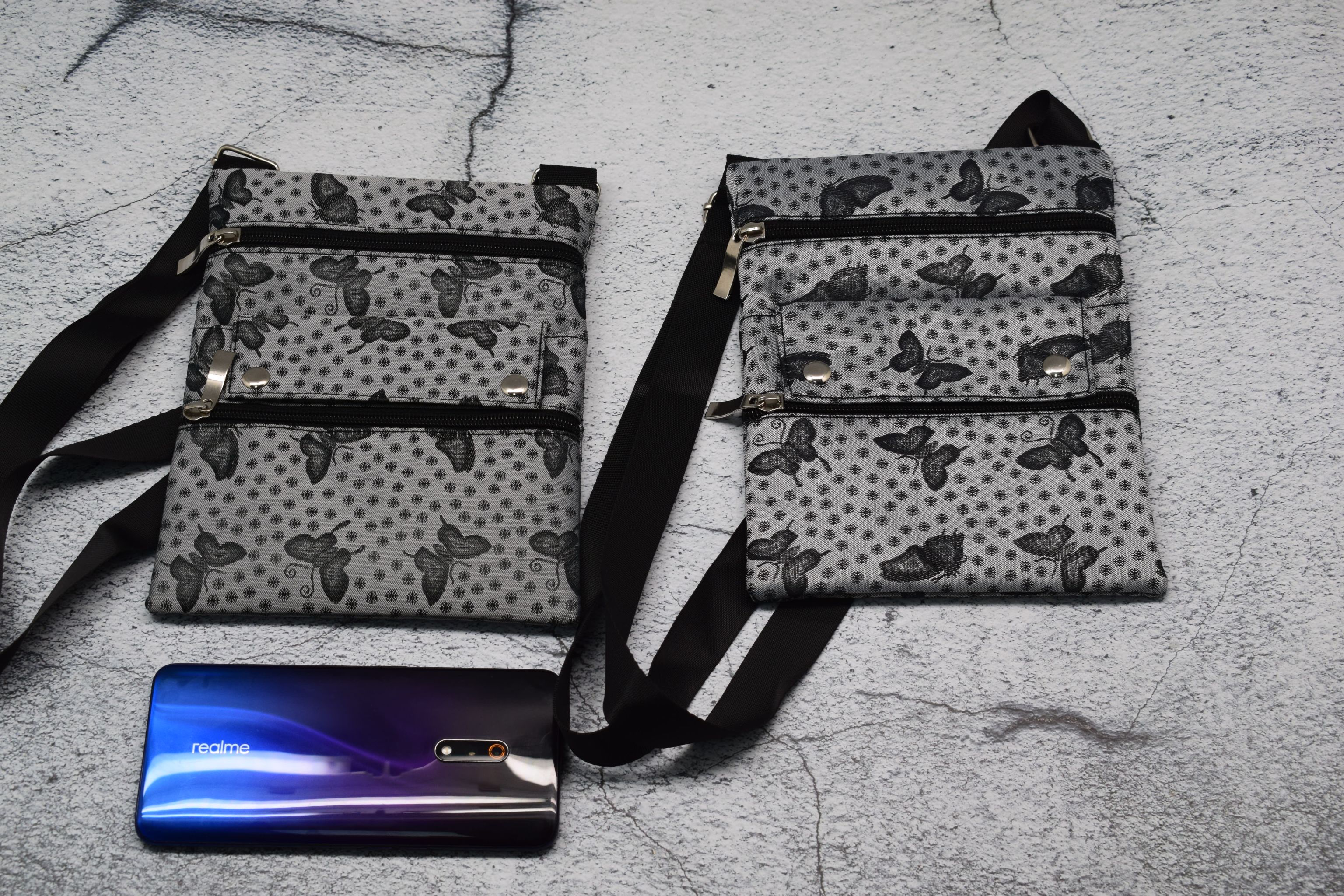 306灰蝴蝶证件包提花料斜挎包