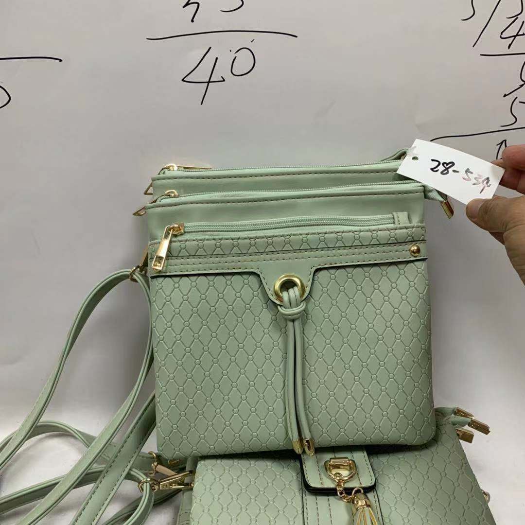 Qianfu round leather perforated leather strip women's three-pull crossbody bag