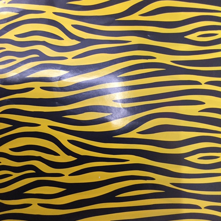 Yellow striped zebra-striped paper