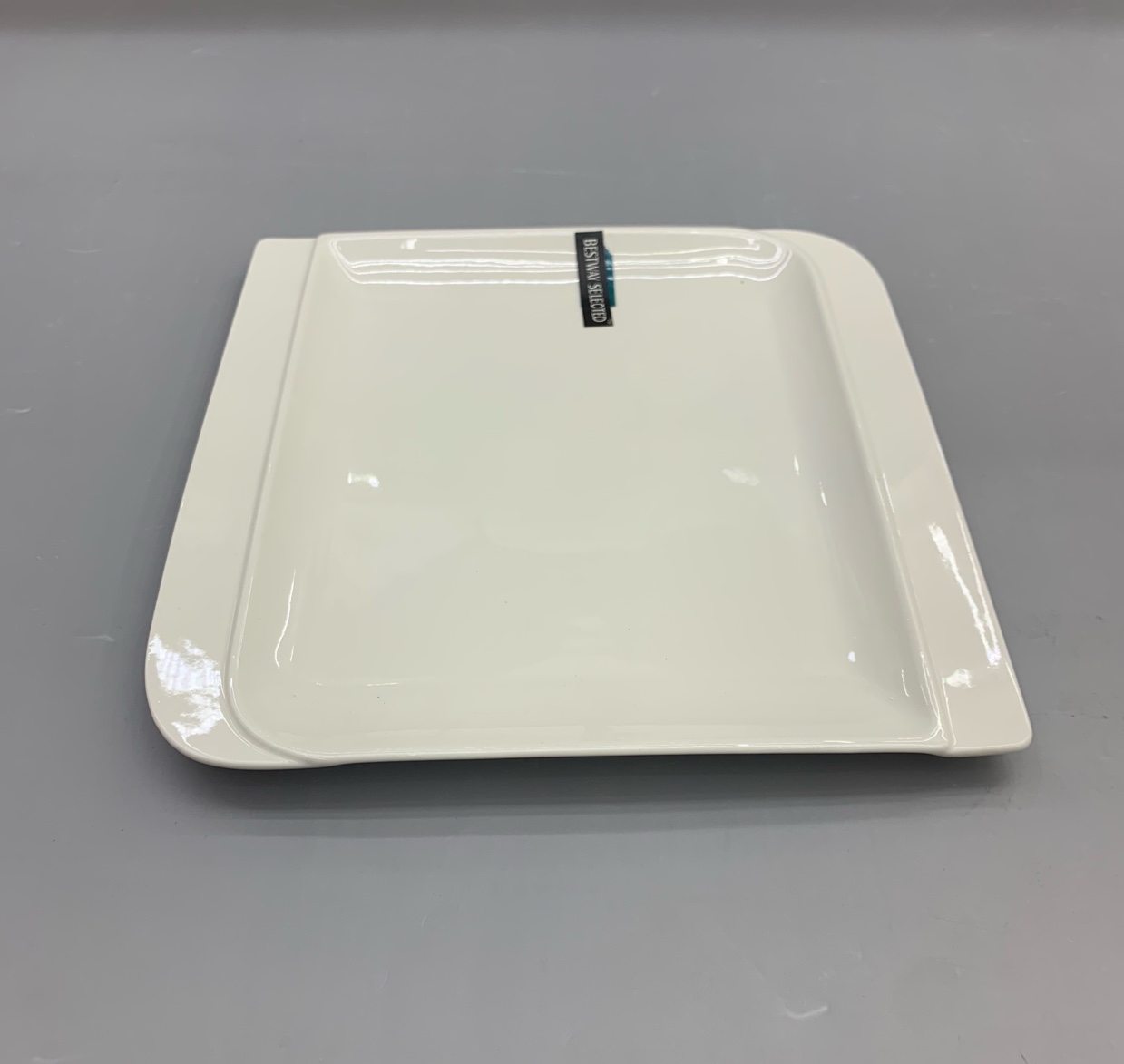 A 10-inch white ceramic flat plate