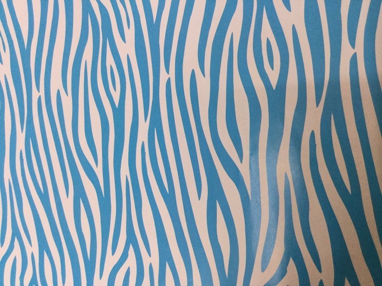 Light blue zebra-print wrapping paper