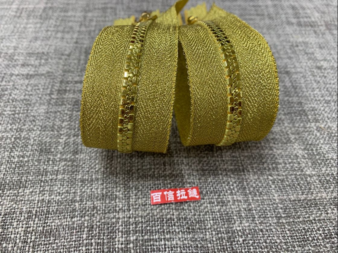 5号树脂拉链  金银布袋  耳环头拉头  闭口净长20cm   厂家直销详情3