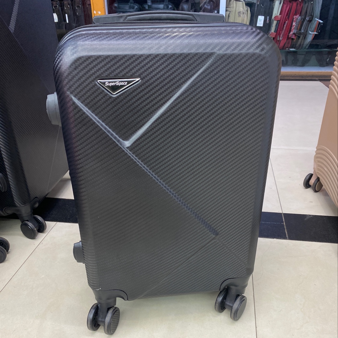 LC-112黑色ABS时尚炫酷登机箱拉杆箱万向轮图