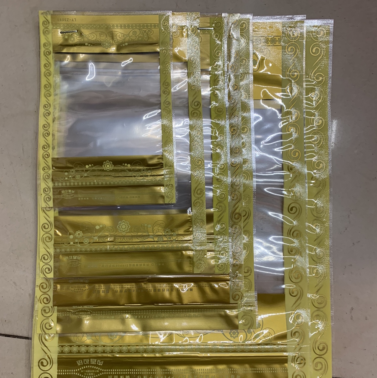 Gold lace composite self-standing bone bag 12*20