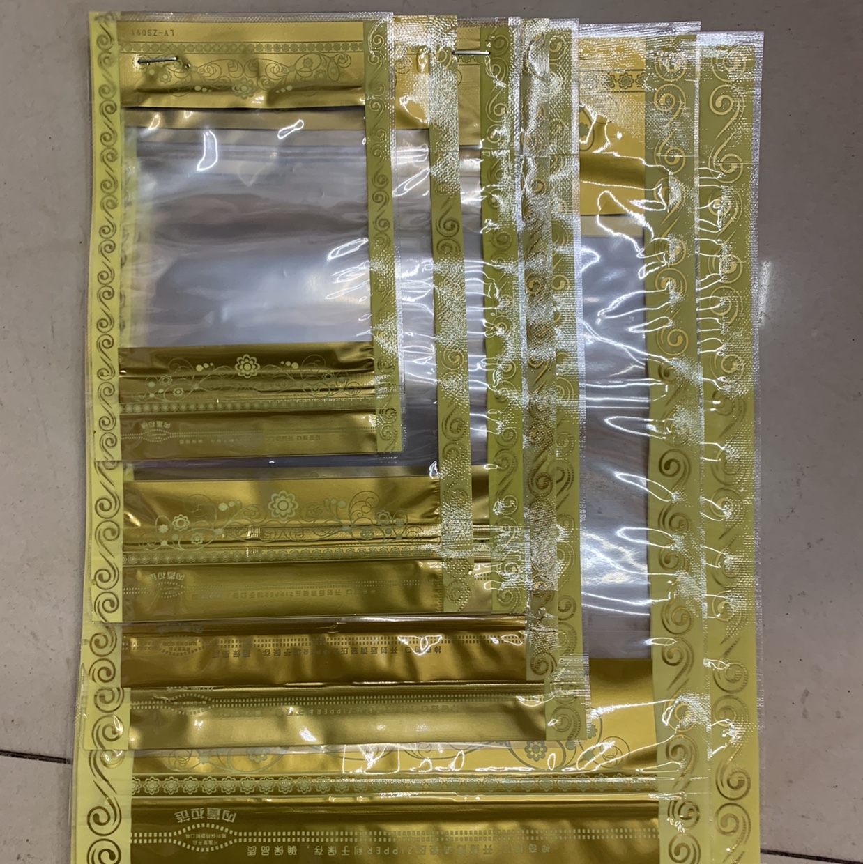 Golden lace composite self-standing bone bag 10*15