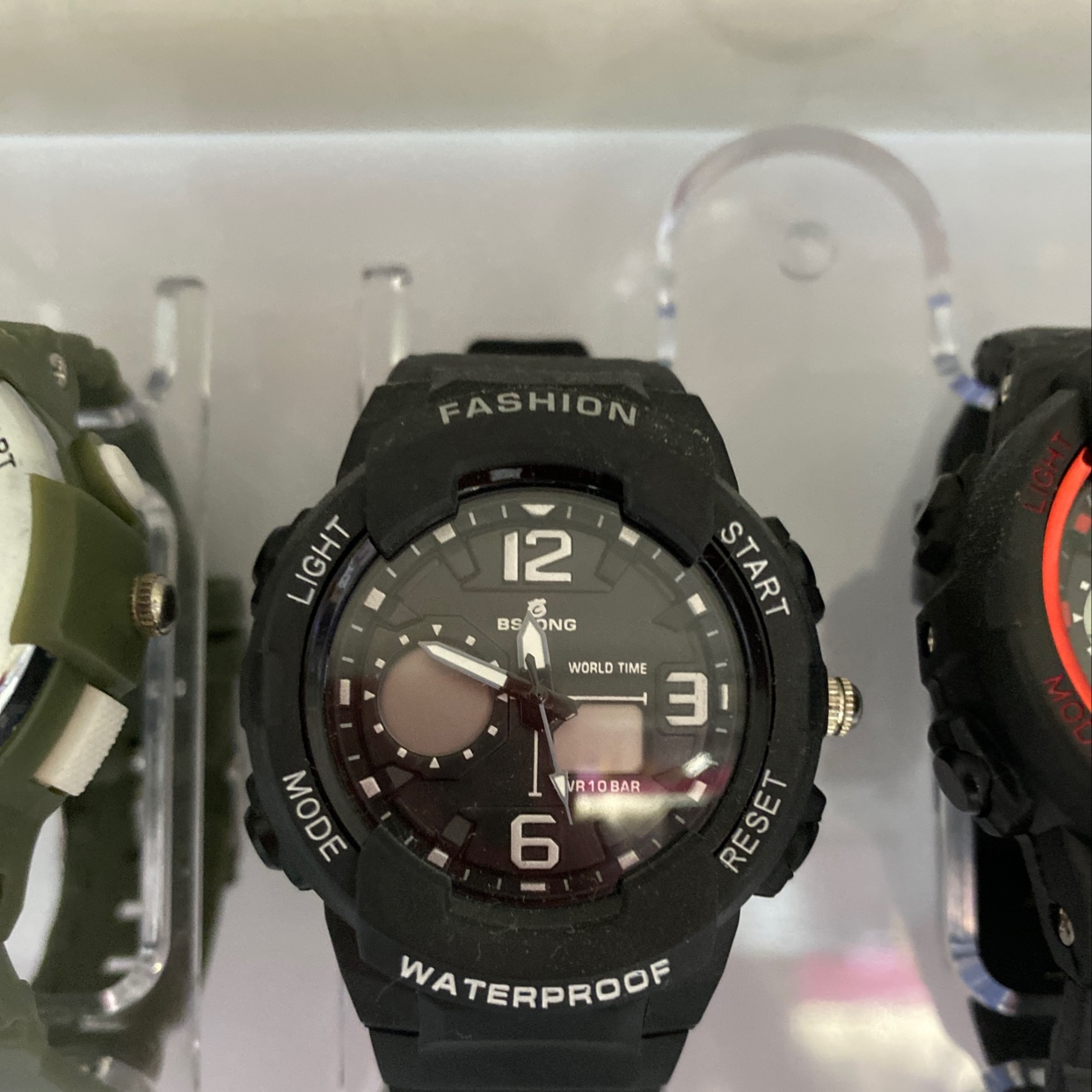 The small black dial of the watch