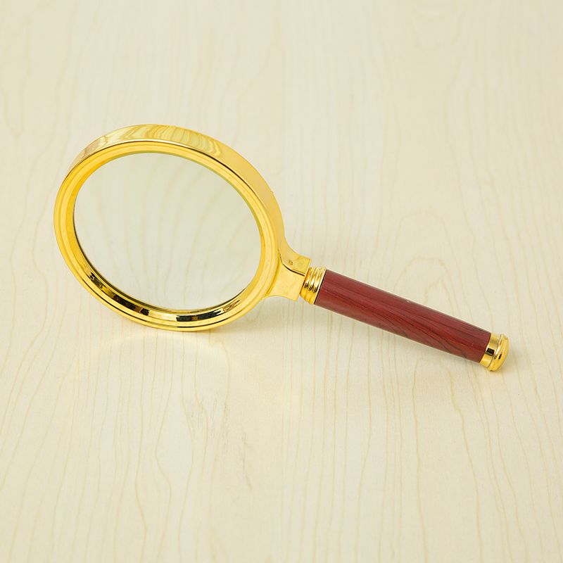 Handheld wooden-handled golden magnifying glass details Picture