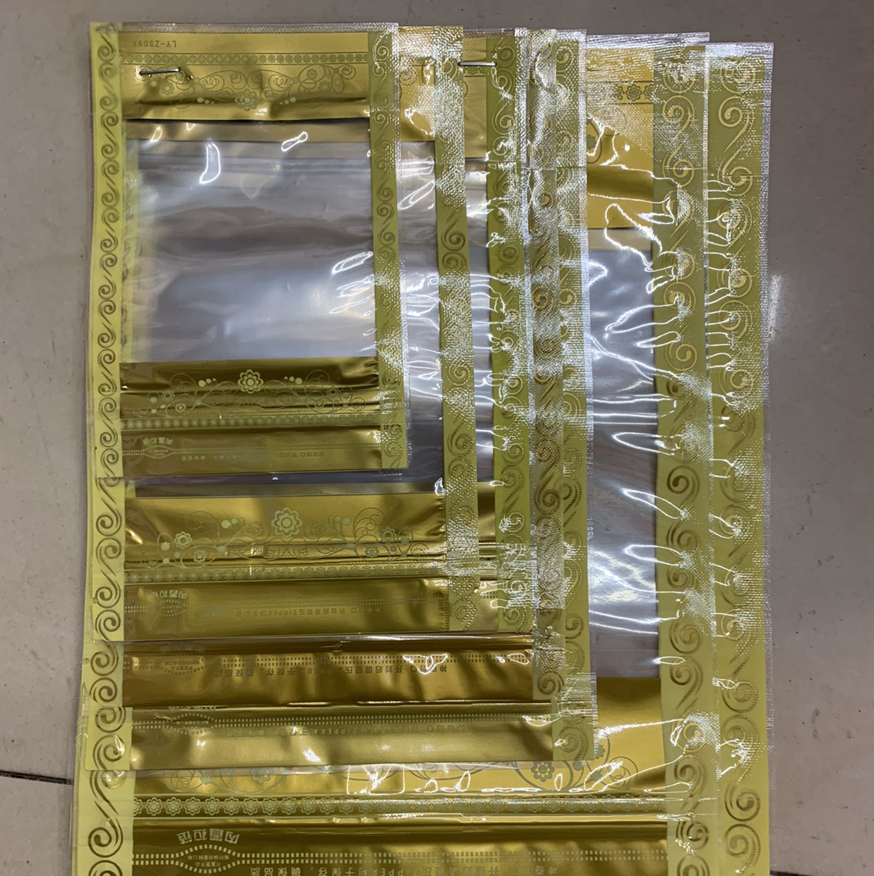 Gold lace composite self-standing bone bag 16*24