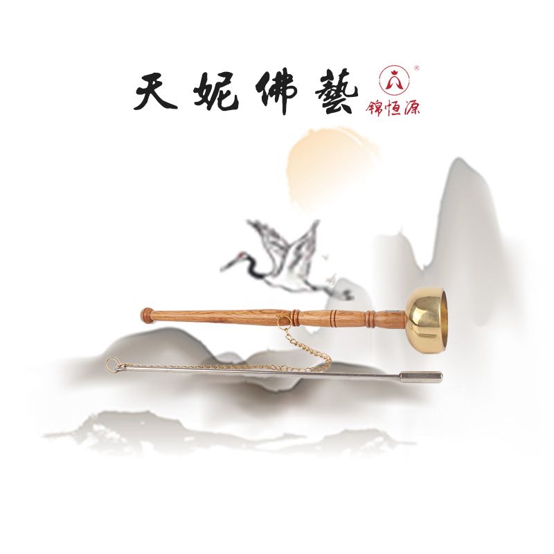The wooden long-handled guiding chime and the copper chime for chanting and assisting in the recitation of the Buddha's name are ritual implements details Picture