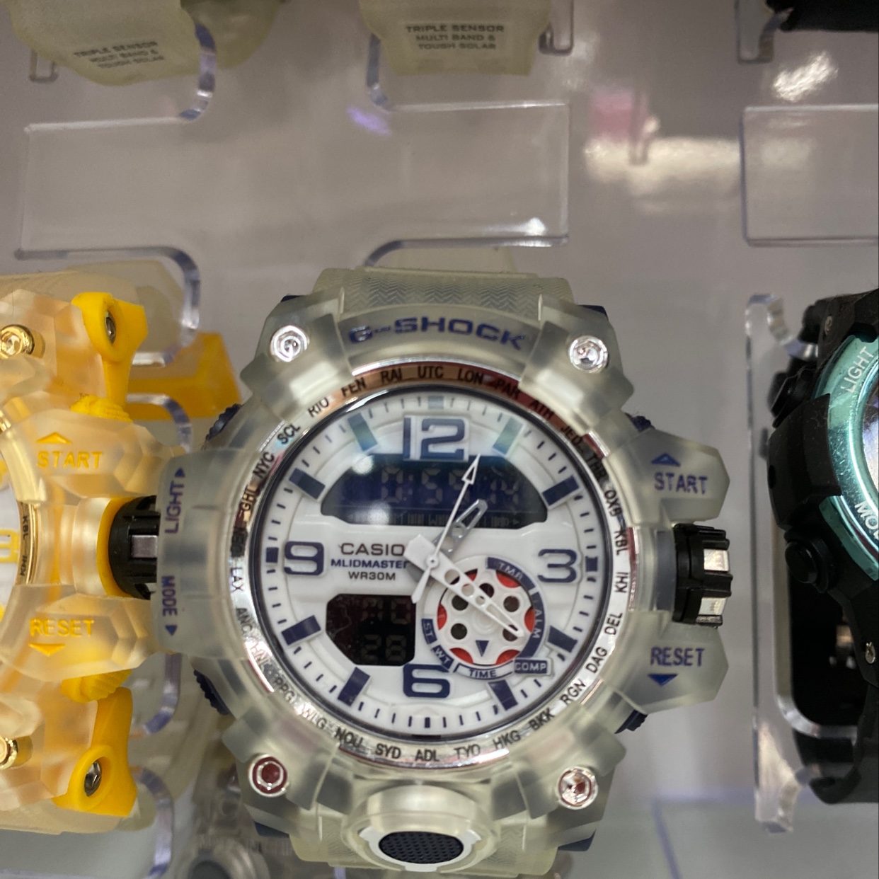 The watch has a large white dial